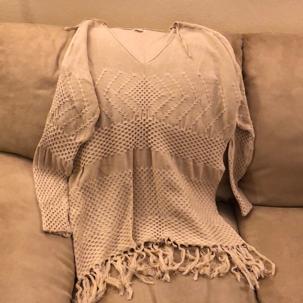 Long cream sweater
